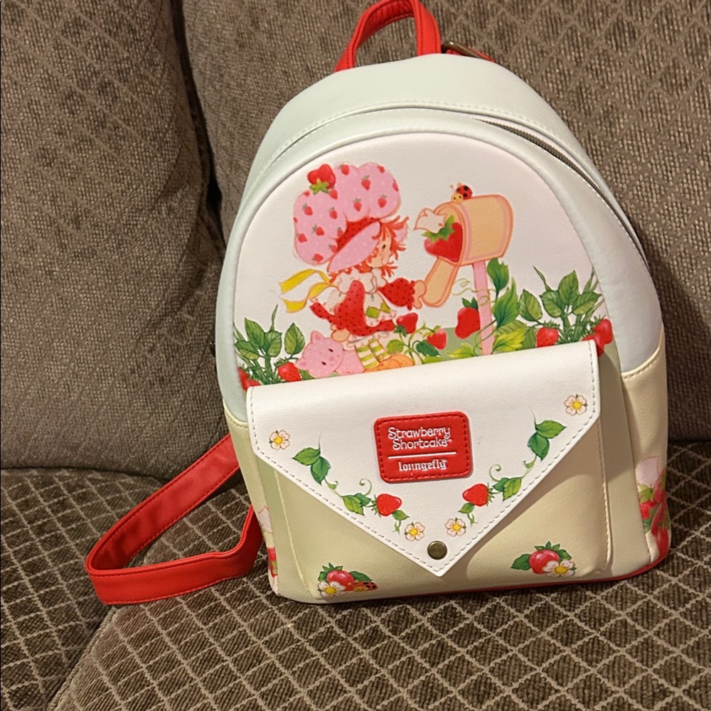 Loungefly Cream and Red Strawberry Backpack